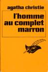 L'homme au complet marron